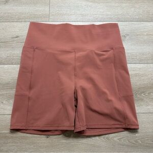 Vuori Women's Studio Pocket Biker Athletic Shorts - Rust Orange